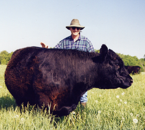 Farmer with cow