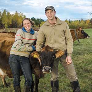 Farmers with cows