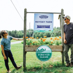 farmers with sign